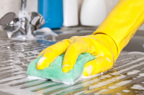 Professional cleaner preparing a domestic cleaning visit in Westkensington