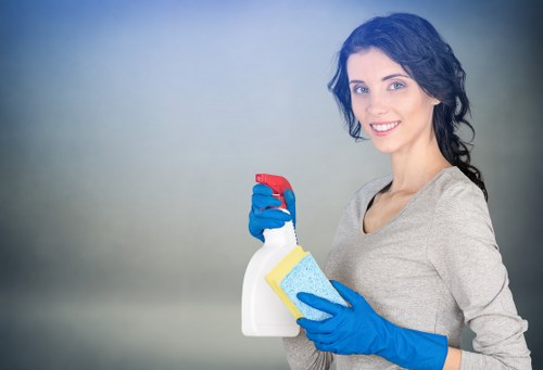 Detailed kitchen and bathroom cleaning during a Westkensington move in service